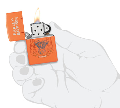 Zippo Harley-Davidson® Legendary Design Orange Matte Windproof Lighter lit in hand.