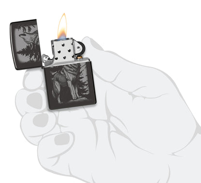 Zippo Howling Wolf Design High Polish Black Windproof Lighter lit in hand.