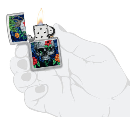 Zippo Skull Sprout Design Street Chrome Windproof Lighter lit in hand.