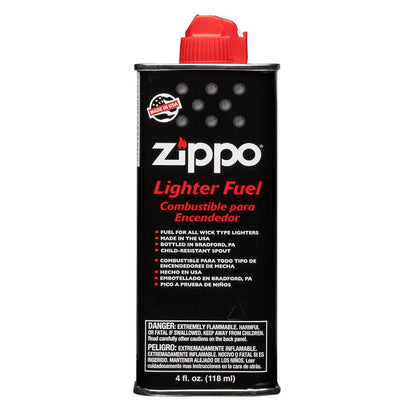 A 4 oz. can of Zippo lighter fluid with a black label and red cap.