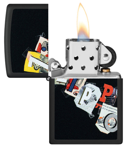 Zippo Cut and Paste Design Black Matte Windproof Lighter with its lid open and lit.